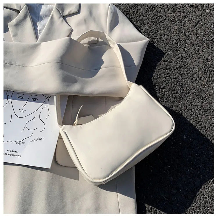 Bolso retro con lazo para mujer, bolso baguette de piel sintética, bolso de hombro estilo occidental, bolso de hombro con protección contra la humedad en las axilas.