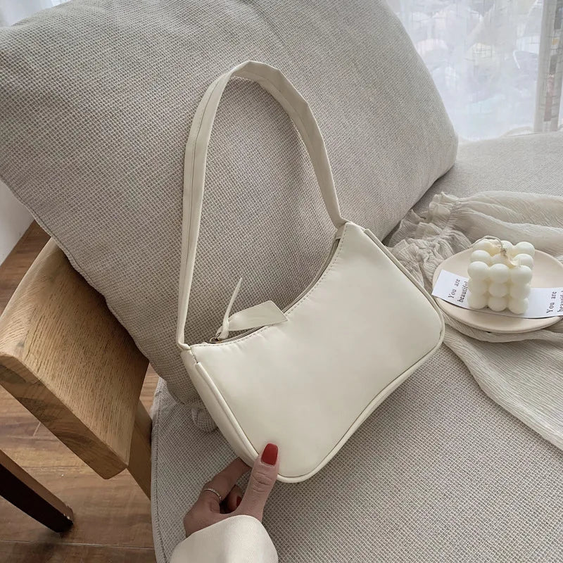 Bolso retro con lazo para mujer, bolso baguette de piel sintética, bolso de hombro estilo occidental, bolso de hombro con protección contra la humedad en las axilas.