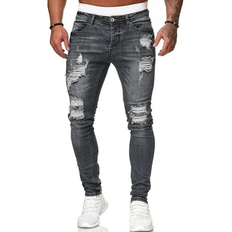 Pantalones vaqueros ajustados rasgados estilo callejero de moda para hombre.