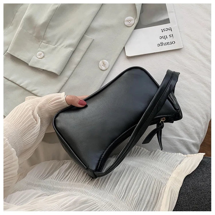 Bolso retro con lazo para mujer, bolso baguette de piel sintética, bolso de hombro estilo occidental, bolso de hombro con protección contra la humedad en las axilas.