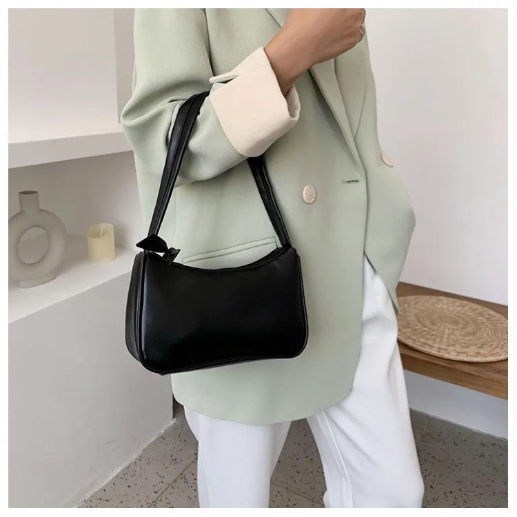 Bolso retro con lazo para mujer, bolso baguette de piel sintética, bolso de hombro estilo occidental, bolso de hombro con protección contra la humedad en las axilas.